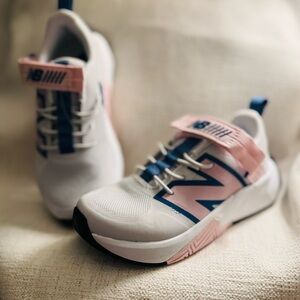 New Balance Kids Sneakers in White, Pink, and Blue